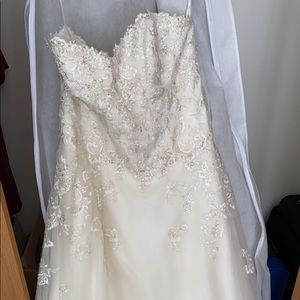 Selling a Wedding Dress! Shoes & veil as well! Photos are crop can send others.
